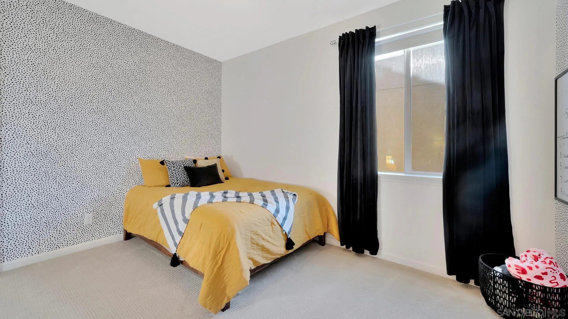 17568 Ralphs Ranch Road San Diego, CA 92127 - Photo 31 of 59 a bed sitting in a bedroom next to a cabinet