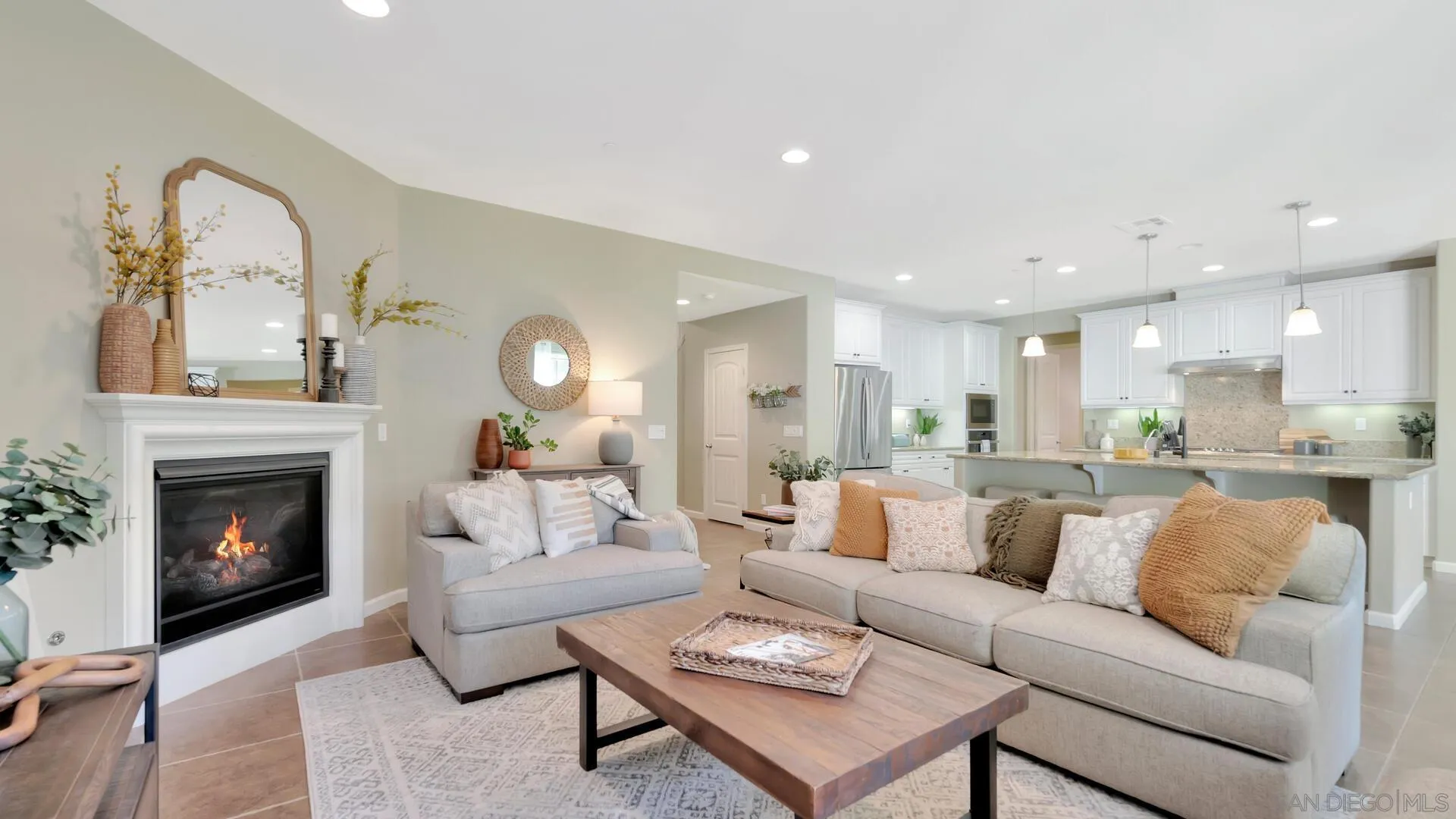 17568 Ralphs Ranch Road San Diego, CA 92127 - Photo 4 of 59 a living room with furniture and a fireplace