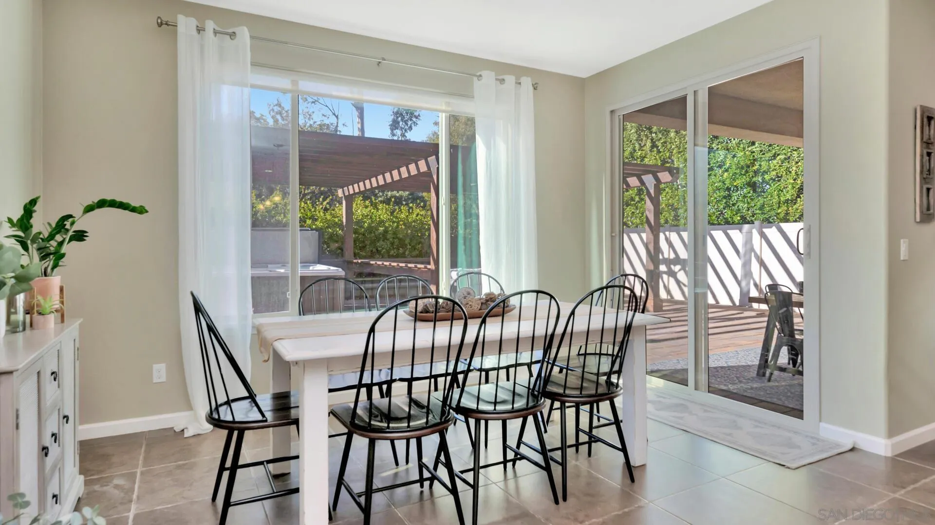 17568 Ralphs Ranch Road San Diego, CA 92127 - Photo 10 of 59 a view of a dining room with furniture window and outside view