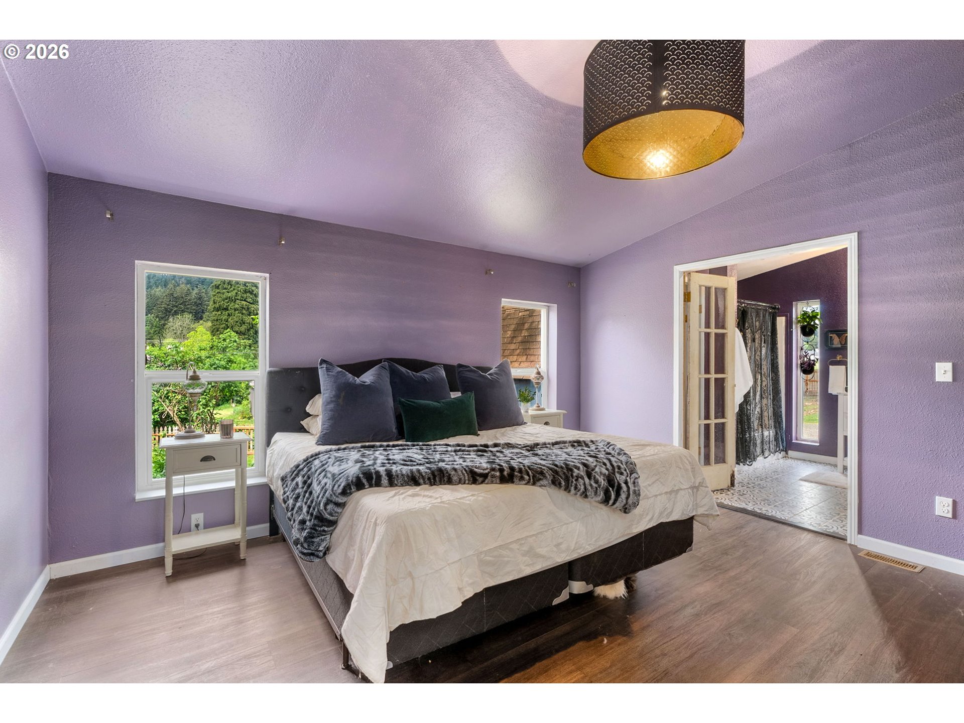 11 2nd Street Carson, WA 98610 - Photo 15 of 40 a bed room with a bed and a chair