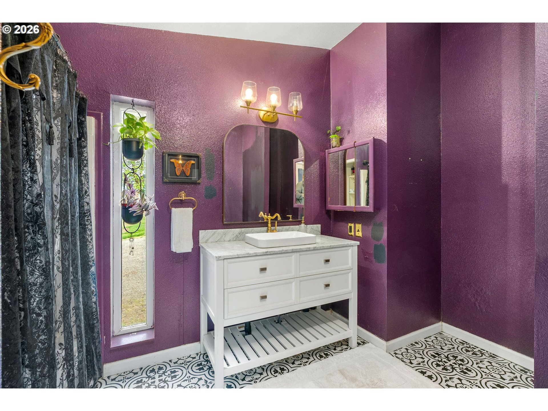 11 2nd Street Carson, WA 98610 - Photo 17 of 40 a bathroom with a sink a vanity and a mirror