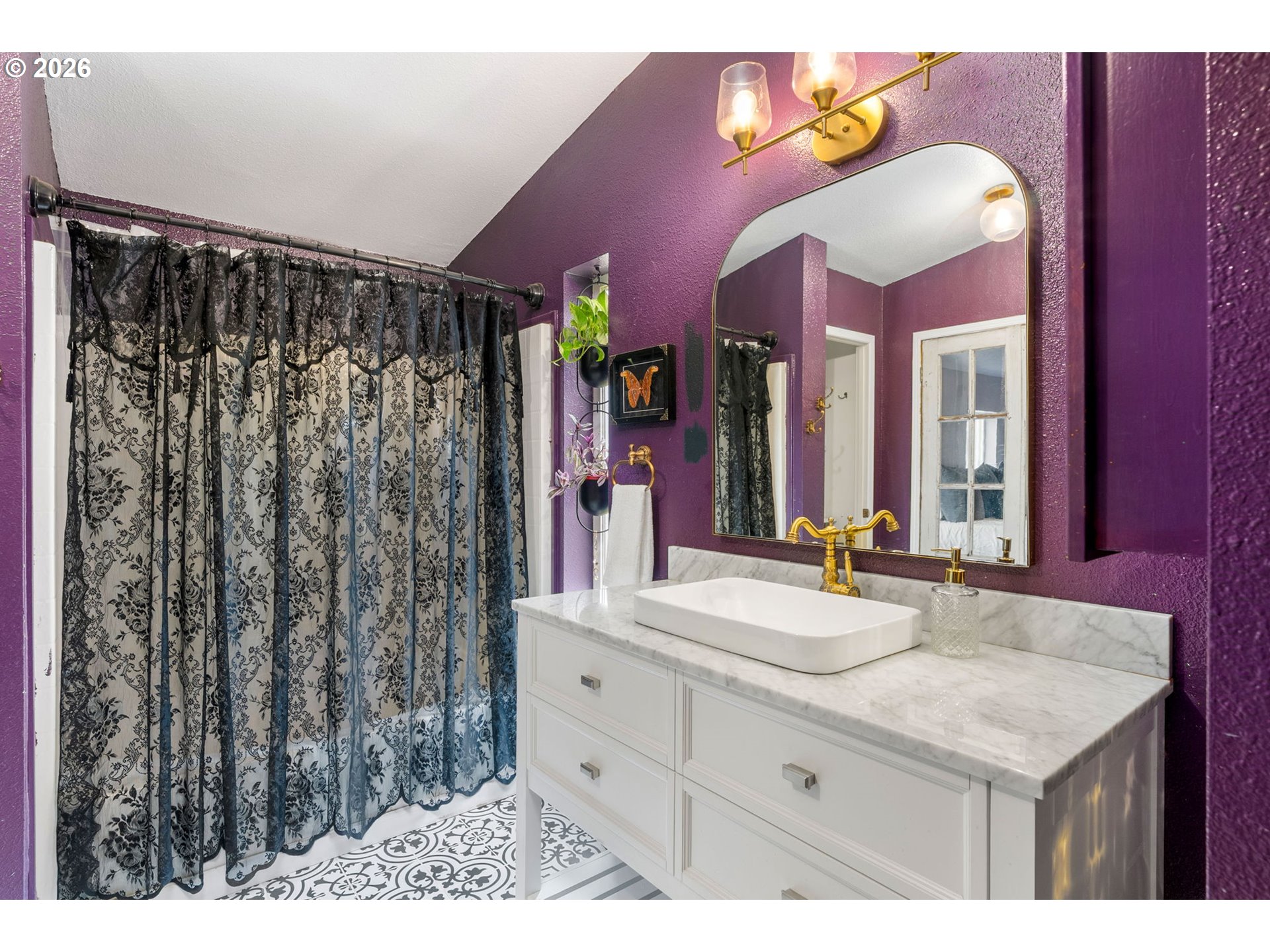 11 2nd Street Carson, WA 98610 - Photo 18 of 40 a bathroom with a sink vanity and a mirror