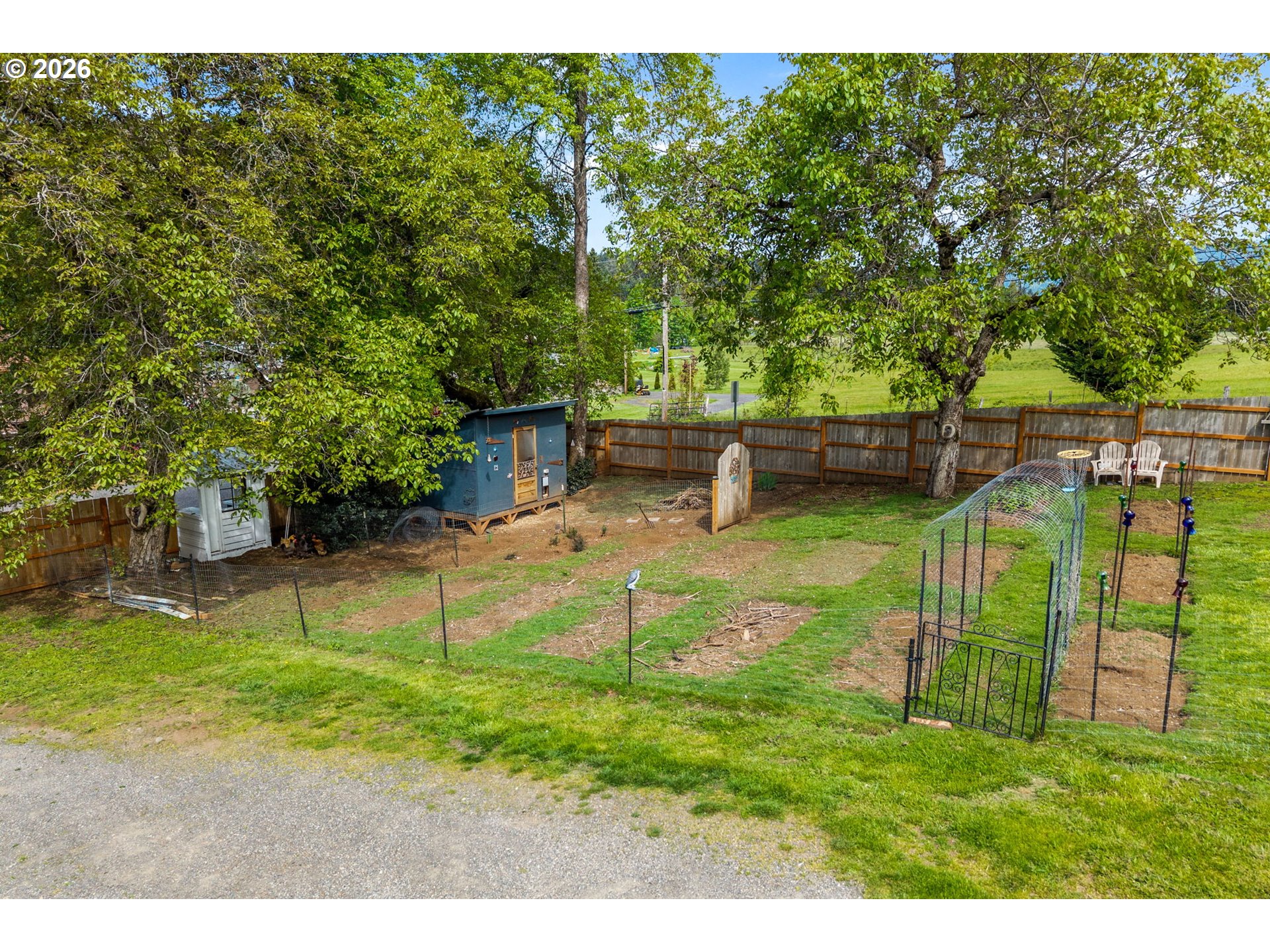 11 2nd Street Carson, WA 98610 - Photo 29 of 40 a view of a house with a backyard