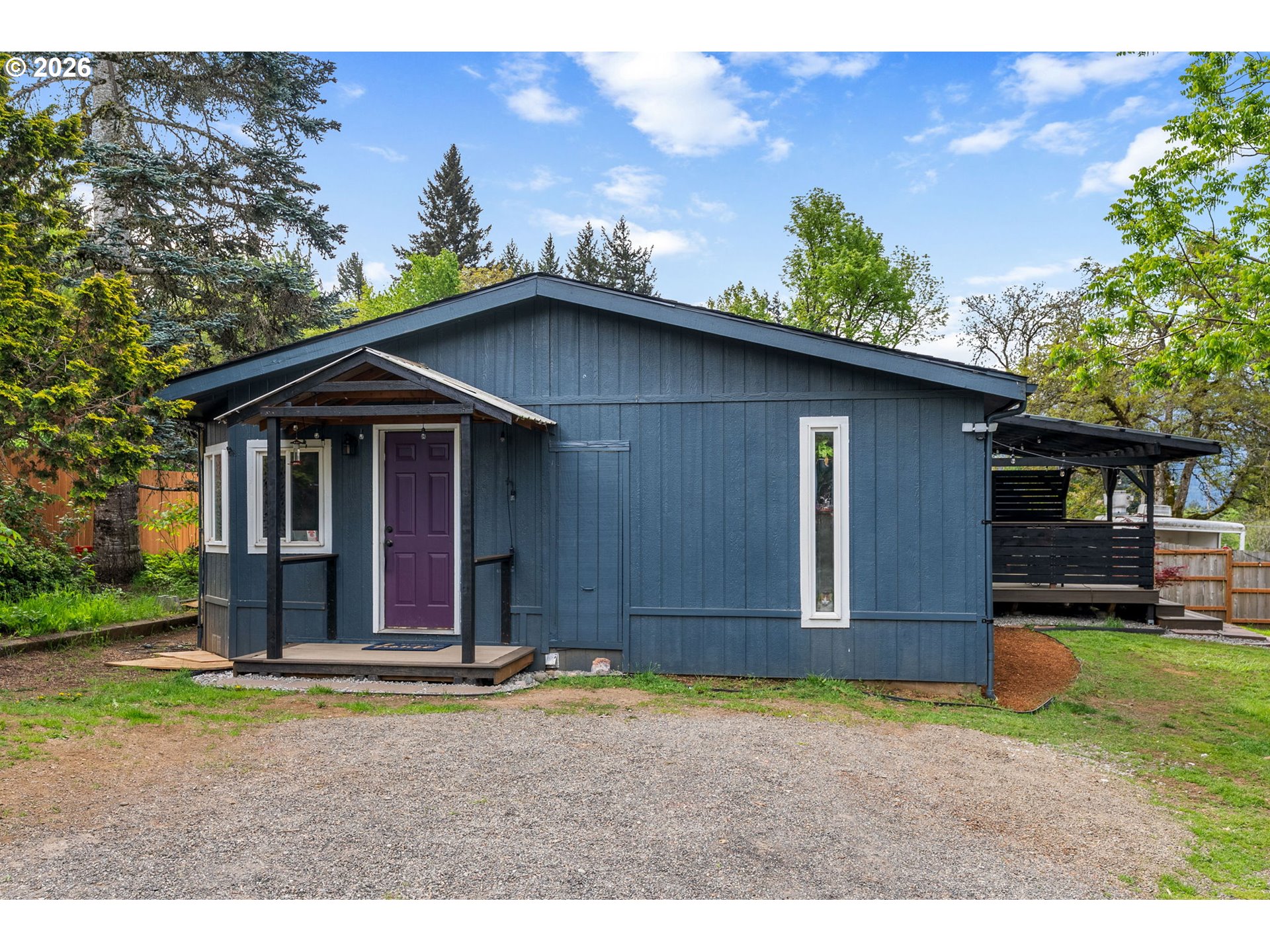 11 2nd Street Carson, WA 98610 - Photo 38 of 40 a view of a house with a yard