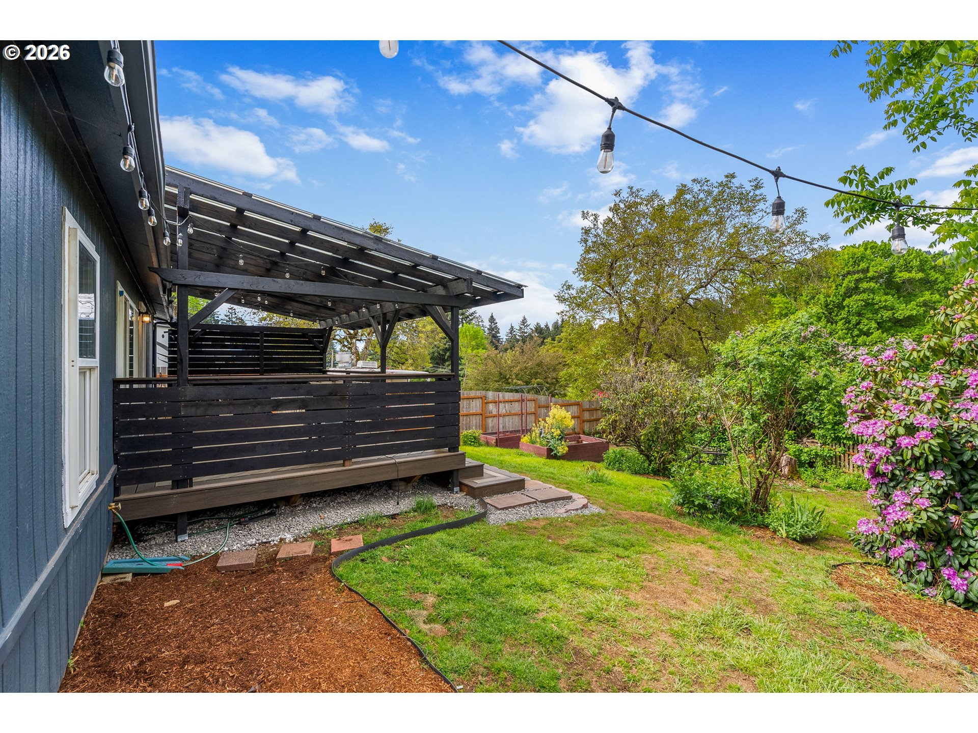 11 2nd Street Carson, WA 98610 - Photo 4 of 40 a view of a backyard with sitting area