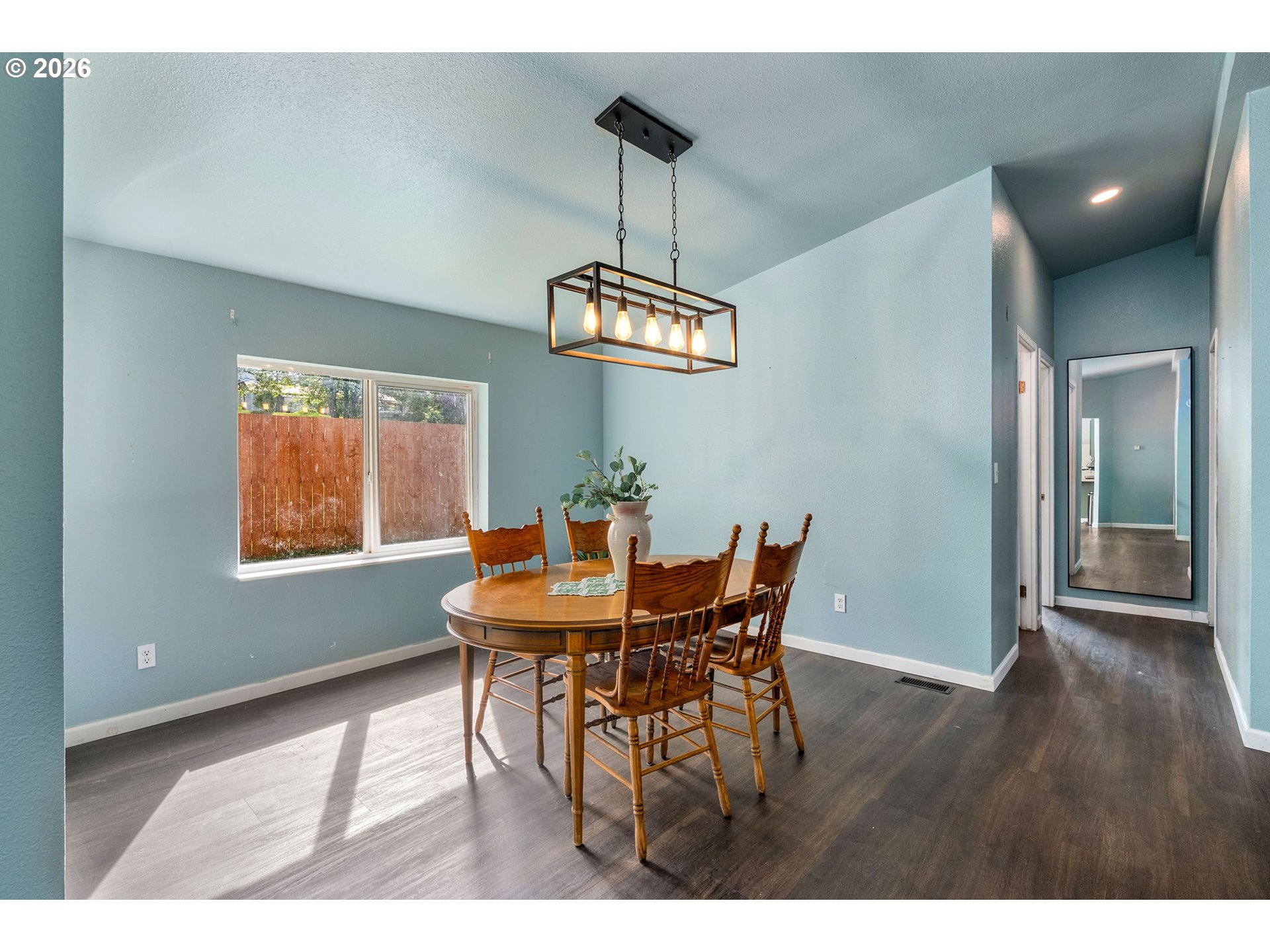 11 2nd Street Carson, WA 98610 - Photo 10 of 40 a view of a dining room with furniture window and wooden floor