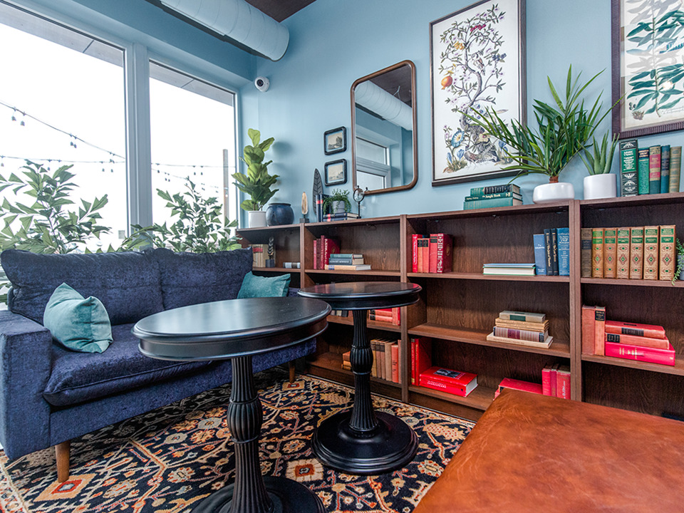 Undisclosed Address Chicago, IL 60613 - Photo 4 of 13 a living room with lots of furniture and a rug