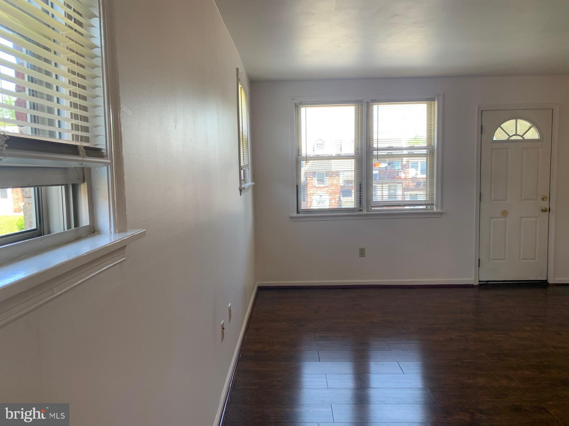 338 Beverly Boulevard Upper Darby, PA 19082 - Photo 5 of 24 Living room with door to balcony