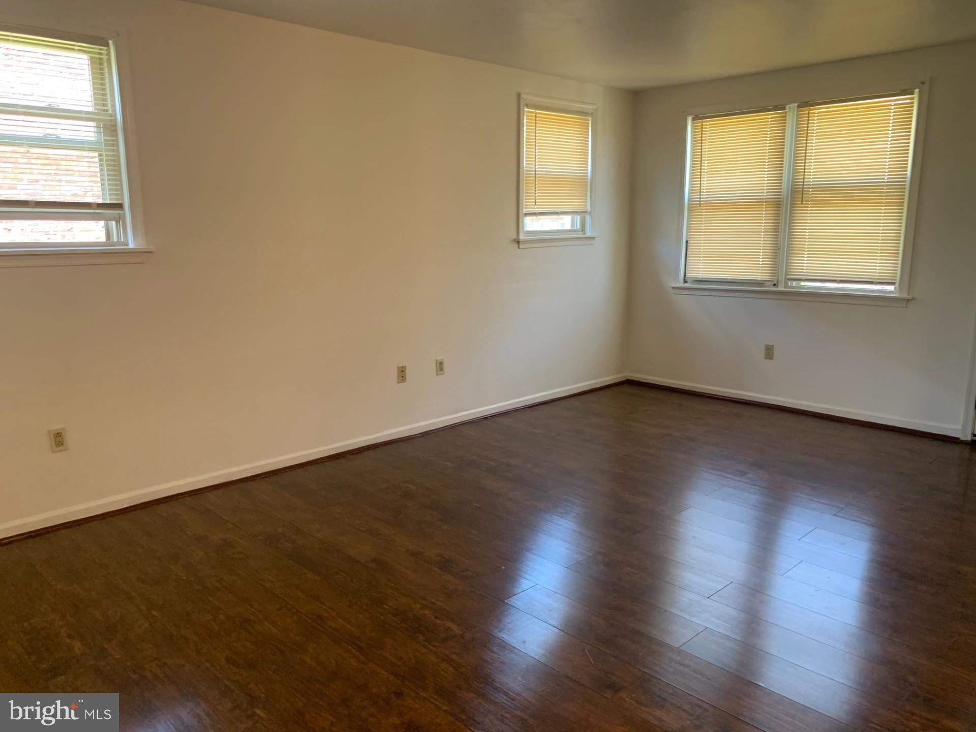 338 Beverly Boulevard Upper Darby, PA 19082 - Photo 6 of 24 Living room w/ many windows