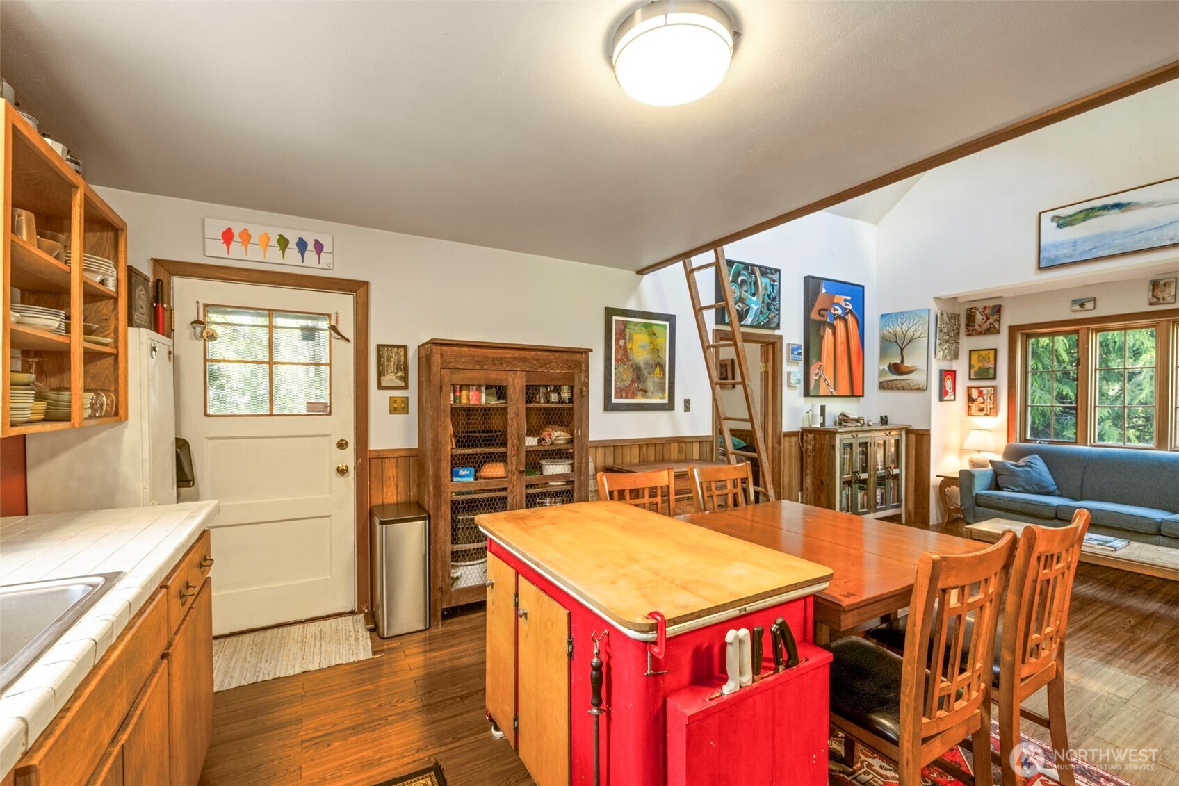 3404 Oysterville Road Oysterville, WA 98641 - Photo 11 of 39 a kitchen with stainless steel appliances granite countertop a kitchen island a stove a table and chairs