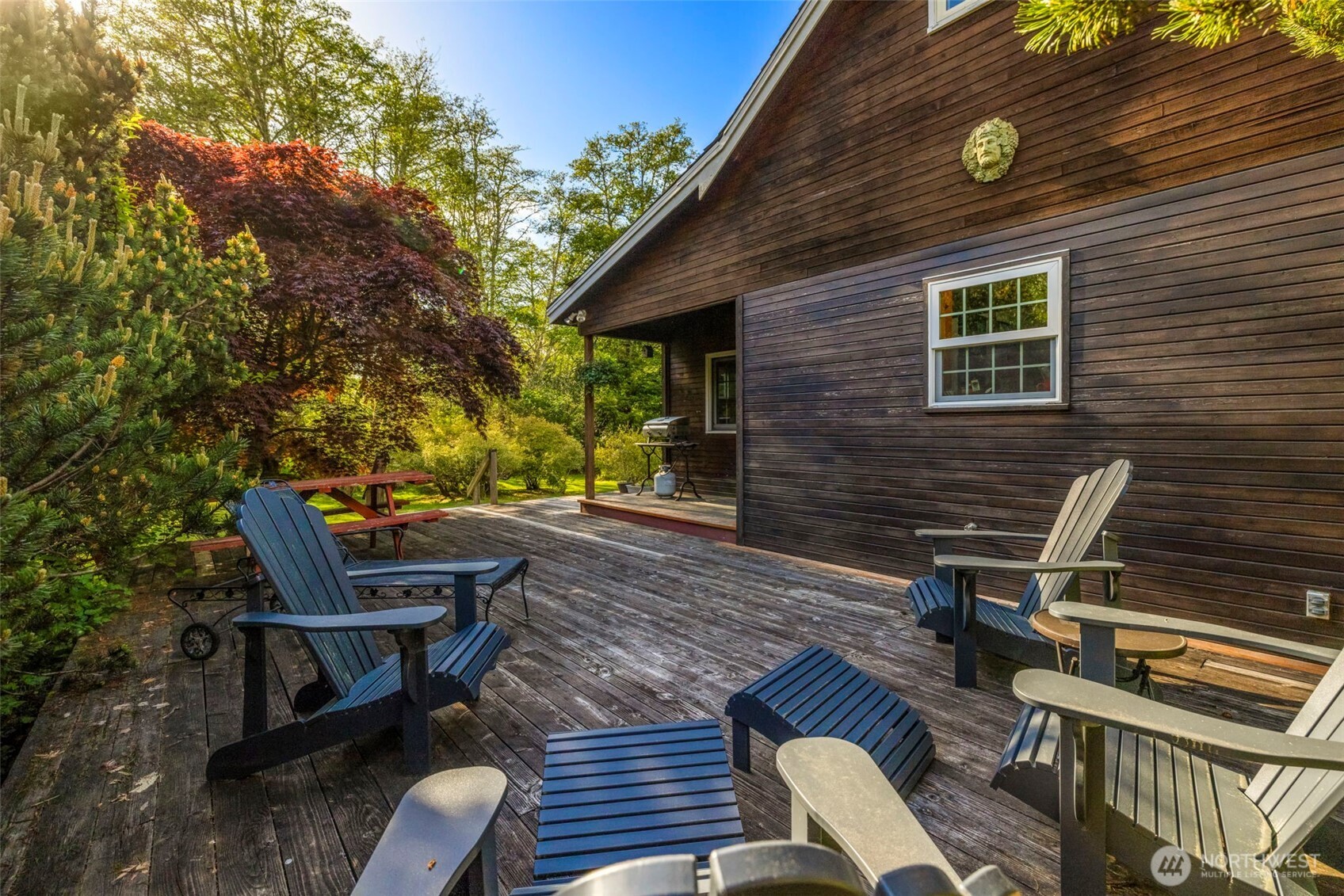 3404 Oysterville Road Oysterville, WA 98641 - Photo 20 of 39 a view of backyard with a deck and furniture