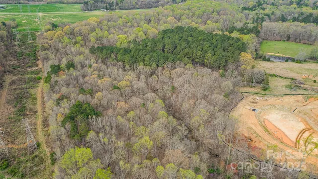 a view of a dry yard with an outdoor space