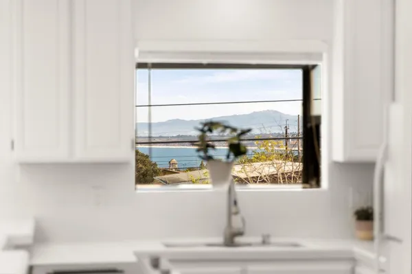 a close up of a white sink