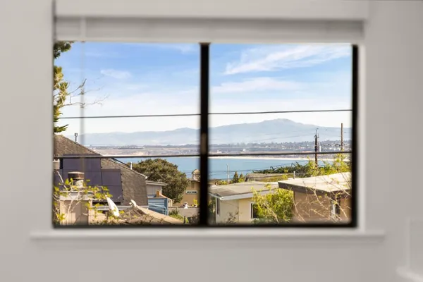 a view of a glass door with a window