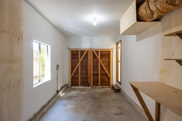 an empty room with windows