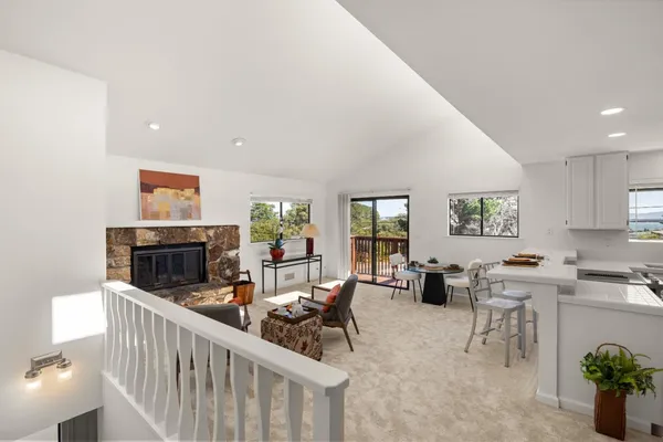a view of a dining room with furniture window and outside view
