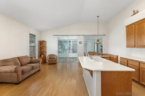 a living room with furniture and a table