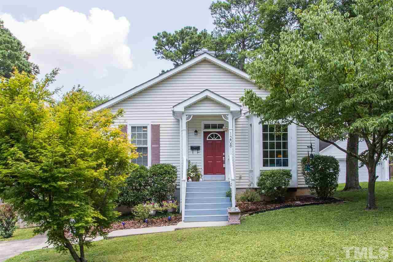1208 Watauga Street Raleigh, NC 27604 - Photo 1 of 26 a view of a house with a yard