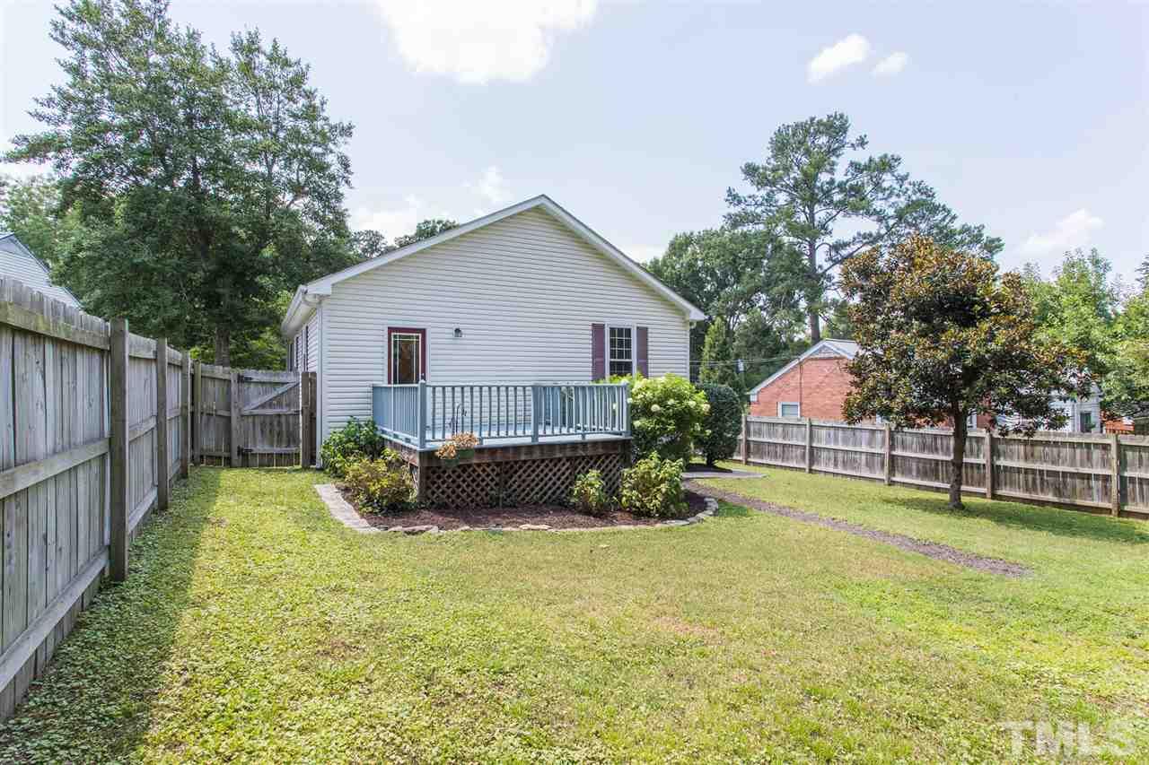 1208 Watauga Street Raleigh, NC 27604 - Photo 20 of 26 a view of a backyard with a garden and plants