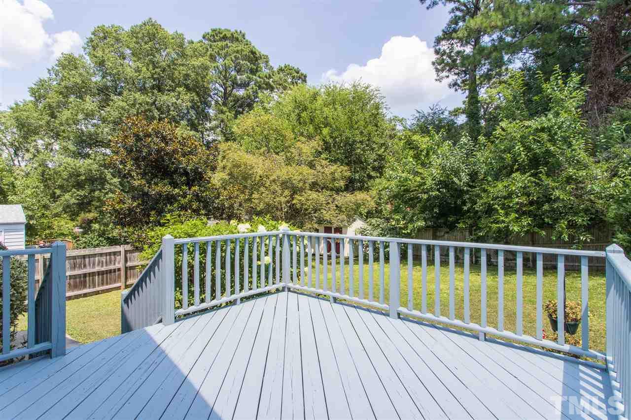 1208 Watauga Street Raleigh, NC 27604 - Photo 25 of 26 a view of balcony with wooden floor and fence