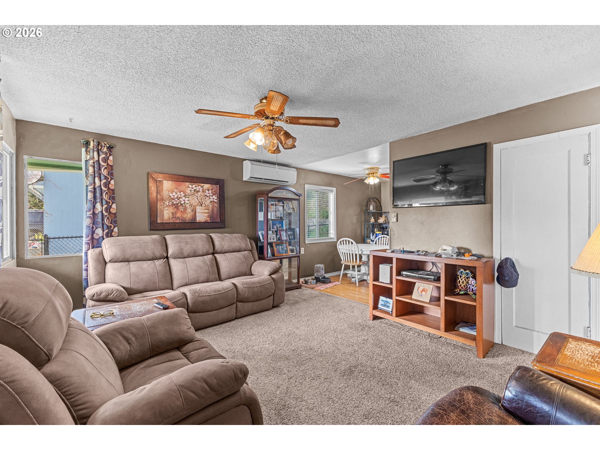 900 West 17th Street Coquille, OR 97423 - Photo 6 of 36 a living room with furniture and a flat screen tv