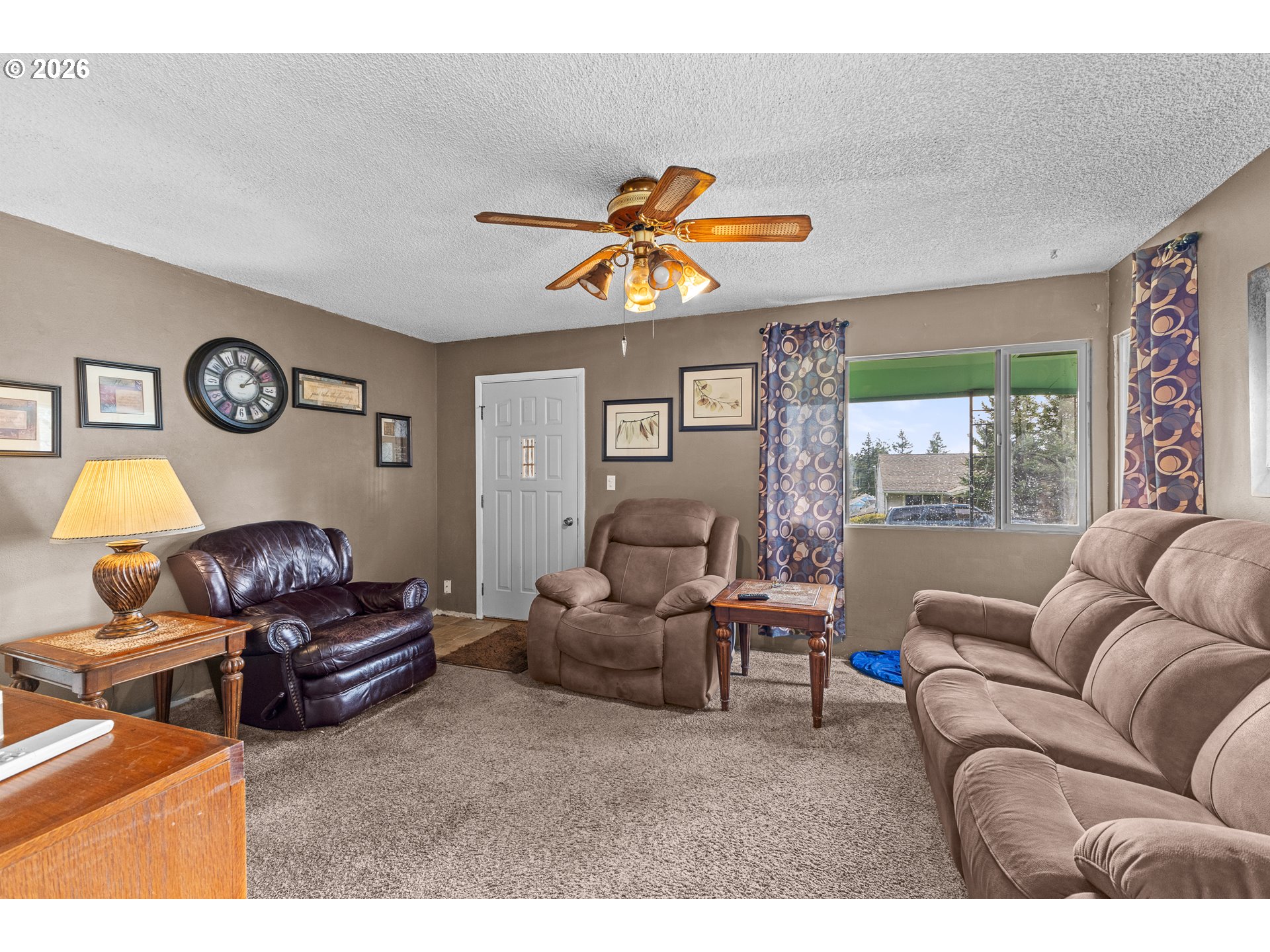 900 West 17th Street Coquille, OR 97423 - Photo 7 of 36 a living room with furniture and a large window