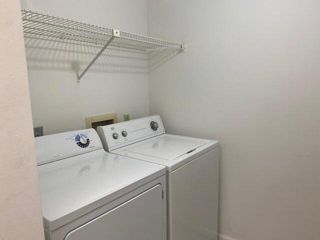 12692 Shoreline Drive, Unit 3C Wellington, FL 33414 - Photo 6 of 12 a utility room with dryer and washer