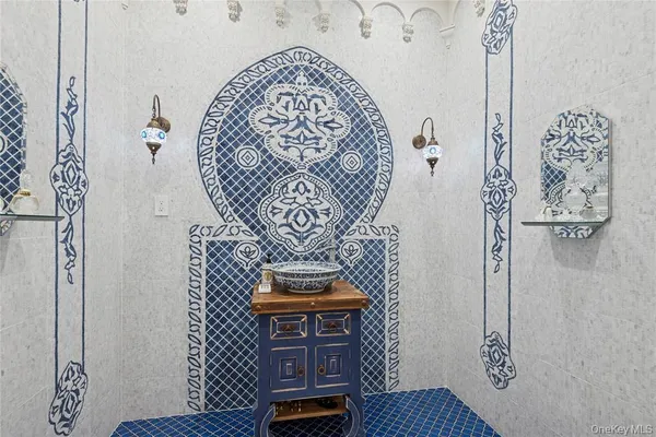 a view of an entryway with wooden floor and a window