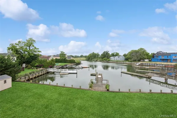 a view of a lake with a balcony