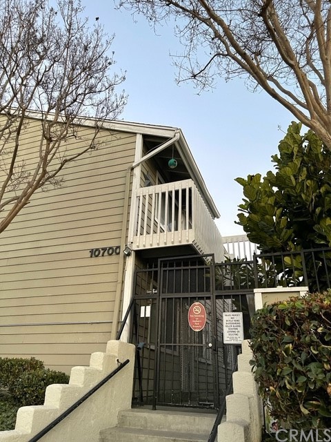 10700 Colima Road, Unit 916 Whittier, CA 90604 - Photo 1 of 1 a front view of house with street