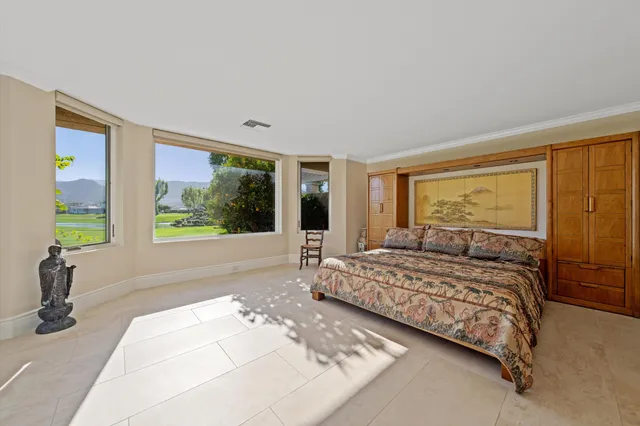 a bathroom with a shower sink vanity and mirror