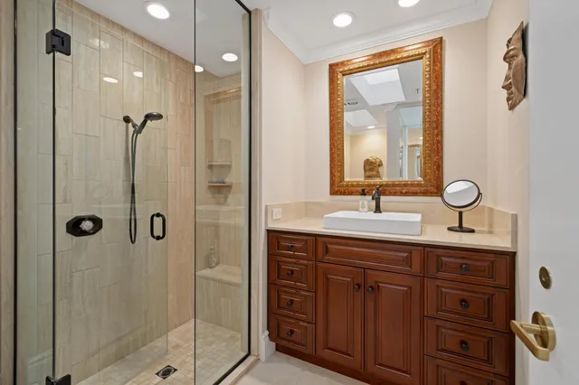 a bathroom with a shower and sink