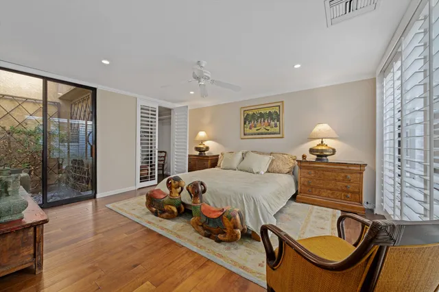 a reading room with furniture and a window