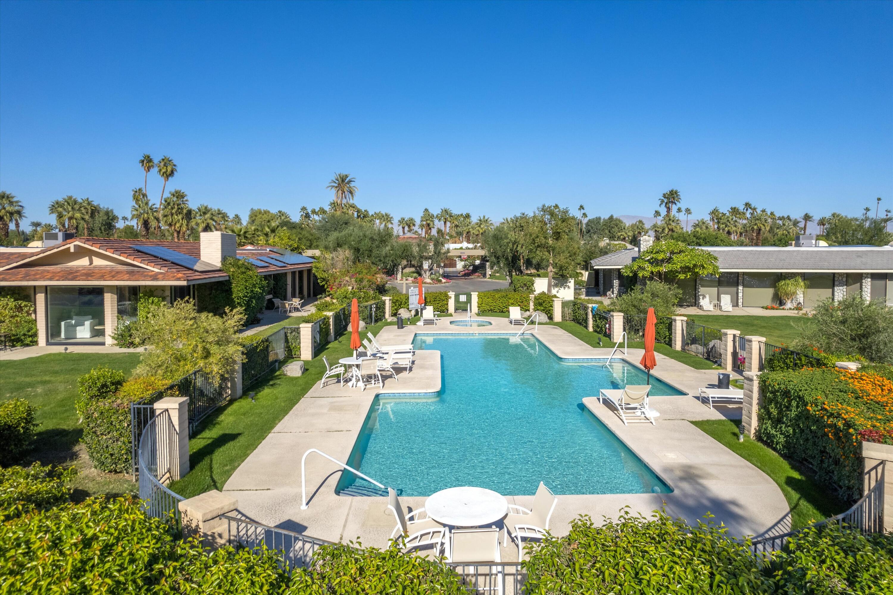 1 Mayfair Drive Rancho Mirage, CA 92270 - Photo 7 of 40 a view of a swimming pool with a patio