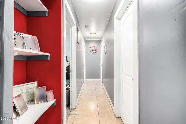 a bathroom with a granite countertop sink a toilet and bathtub