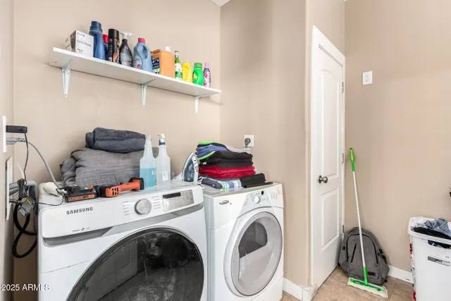 a view of a swimming pool with outdoor seating