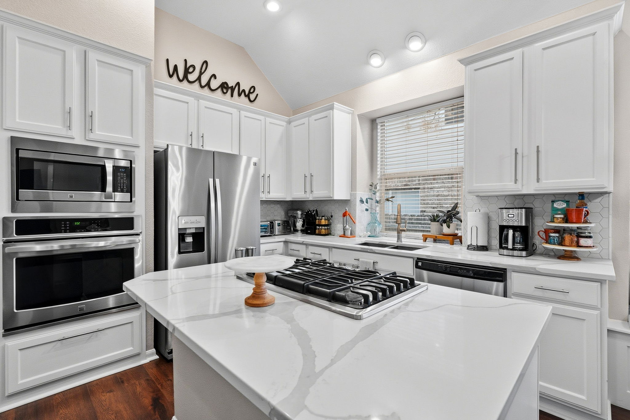 13208 Calf Roping Trail Austin, TX 78727 - Photo 20 of 40 Abundant cabinetry ensures plenty of storage for kitchen essentials.