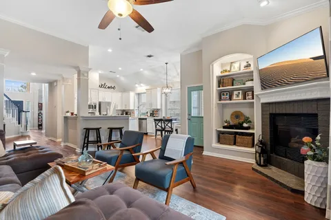 a outdoor living space with furniture and a fireplace