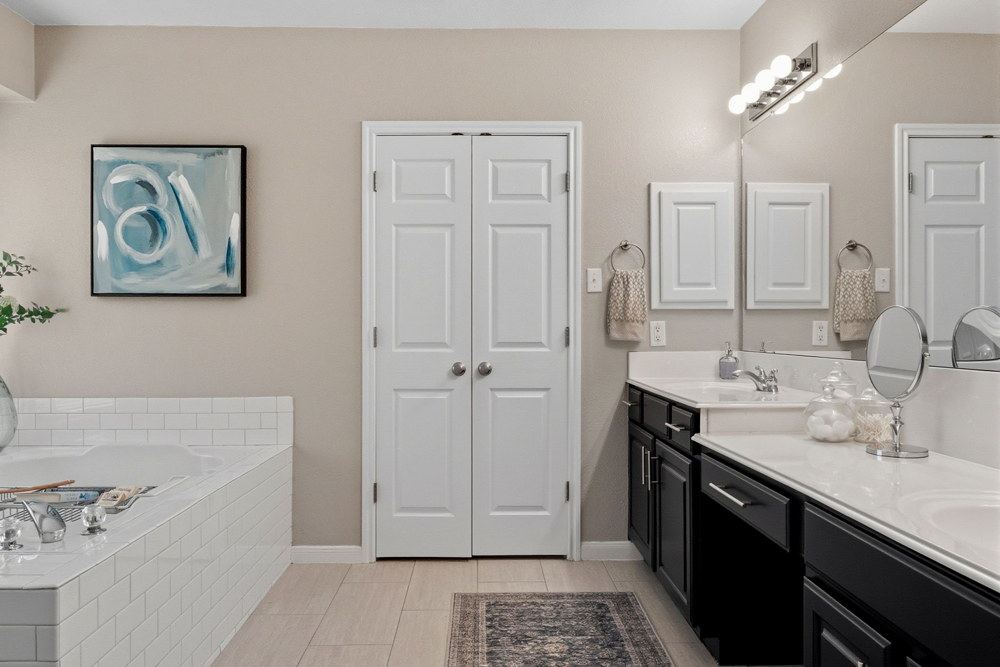 13208 Calf Roping Trail Austin, TX 78727 - Photo 29 of 40 Thoughtfully designed layout keeps the primary bath functional and serene.