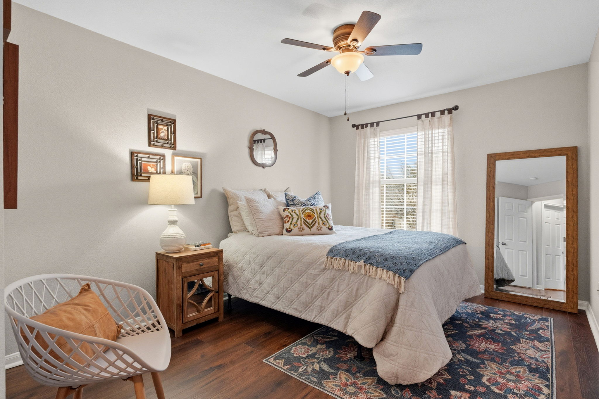 13208 Calf Roping Trail Austin, TX 78727 - Photo 34 of 40 Both guest bedrooms are spacious and filled with natural light.