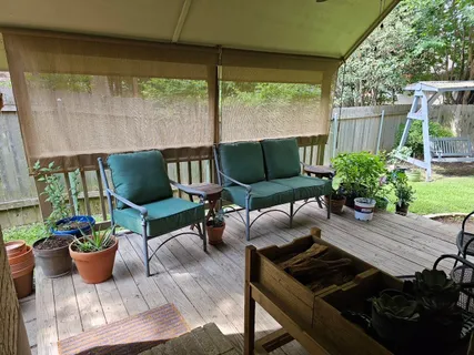 a outdoor living space with furniture and garden view