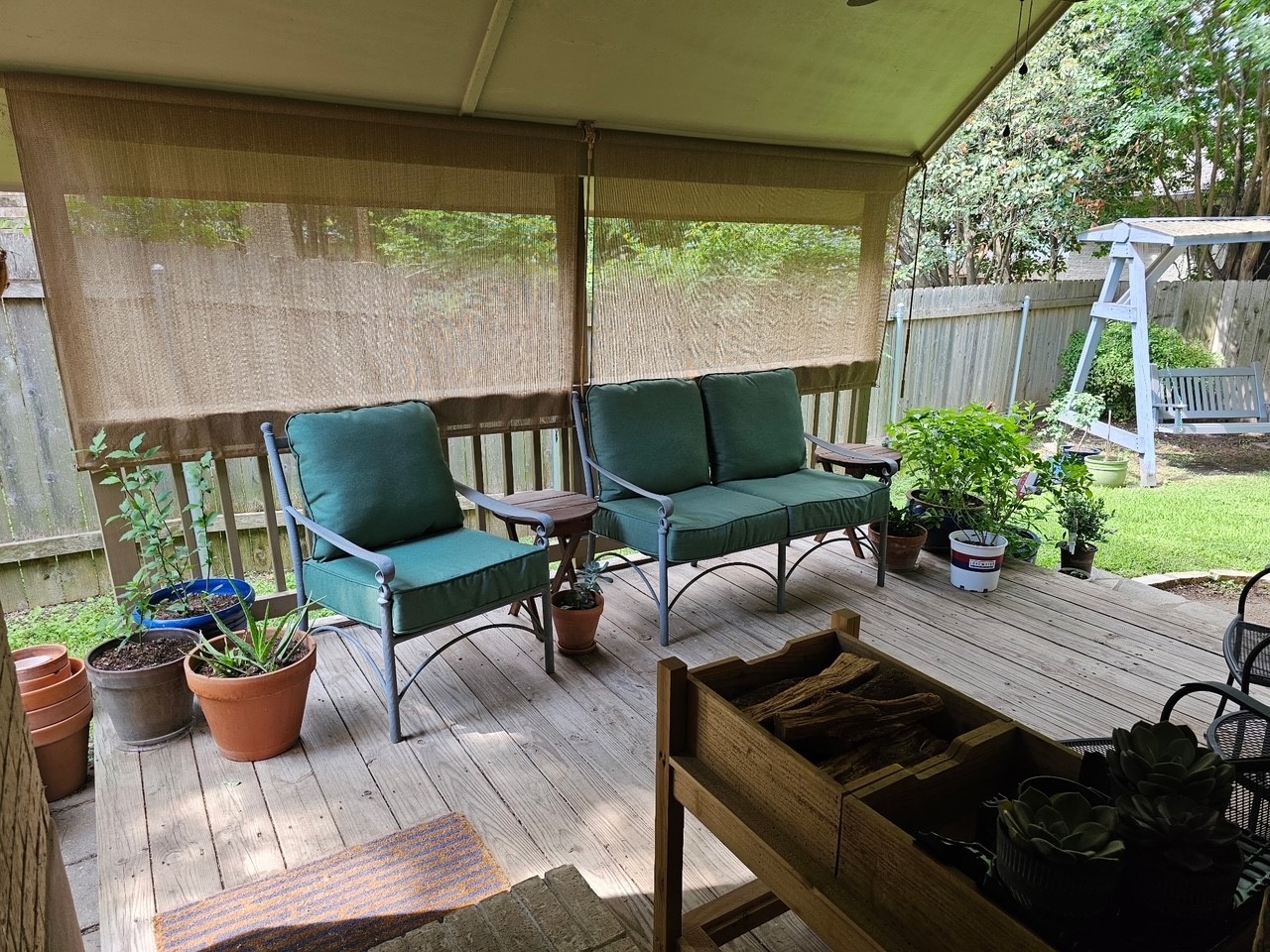 13208 Calf Roping Trail Austin, TX 78727 - Photo 37 of 40 Beautiful covered deck with UV blocking privacy roller shades.