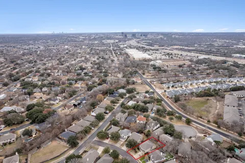 an aerial view of residential building and city view
