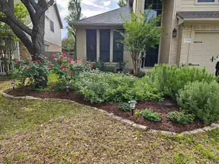 a view of a house with brick walls