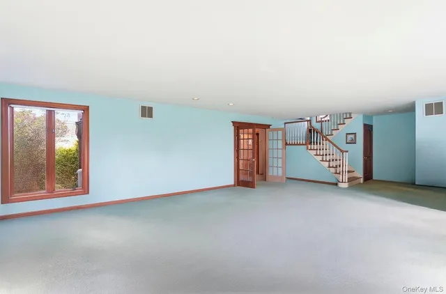 an empty room with windows