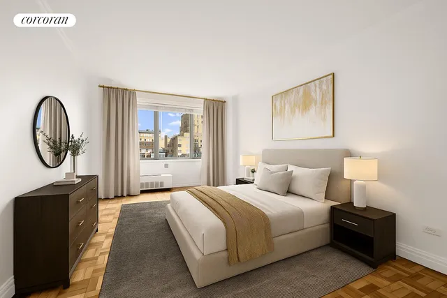 a bedroom with a bed and dresser with mirror