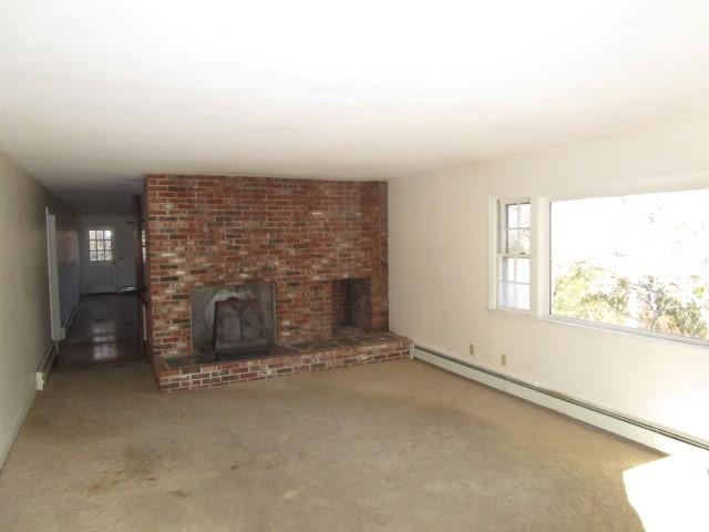 18 Chipman Road Sandwich, MA 02563 - Photo 2 of 16 an empty room with windows