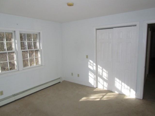 18 Chipman Road Sandwich, MA 02563 - Photo 5 of 16 a view of empty room with windows