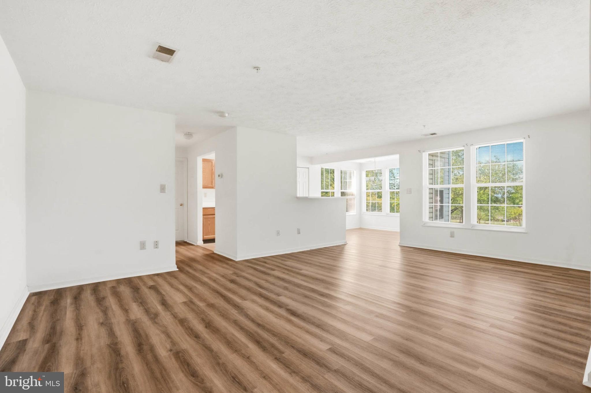 699 Winding Stream Way, Unit 102 Odenton, MD 21113 - Photo 29 of 30 Open floorplan w/ new LVP throughout
