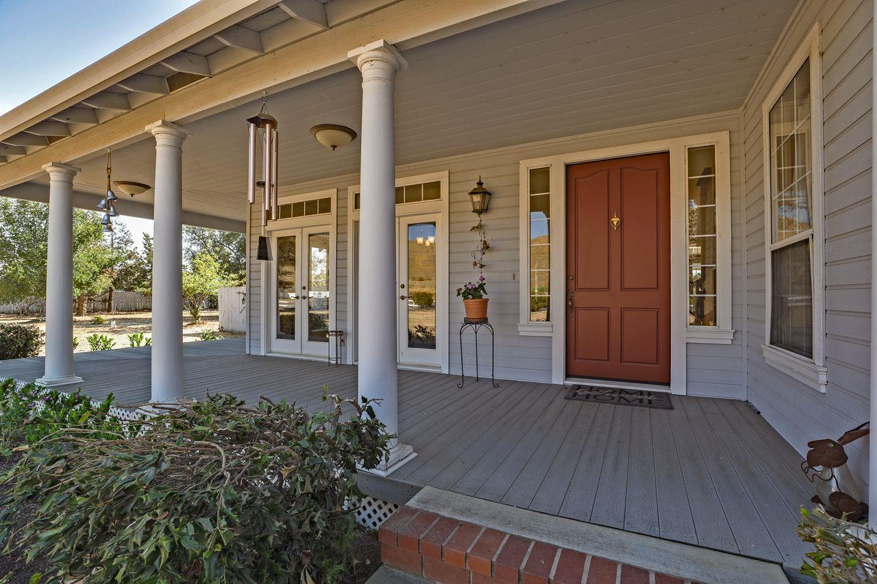5560 Diablo Hills Road Tres Pinos, CA 95075 - Photo 2 of 46 front view of a house with a glass door